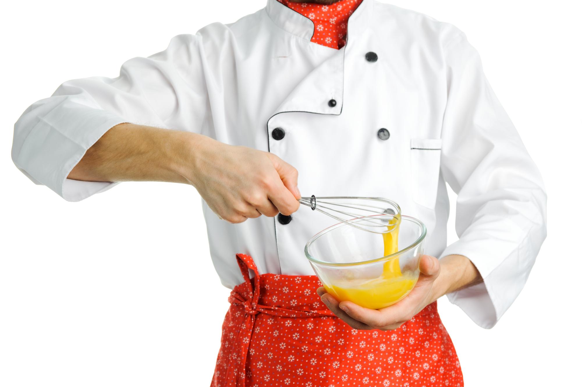 Local chef plating a traditional dish